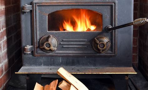 how to keep wood stove glass from getting black